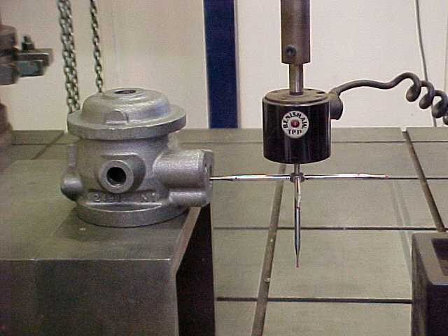 Newby's Co-ordinate Measuring Machine, CMM, verifying the dimensions of a casting.