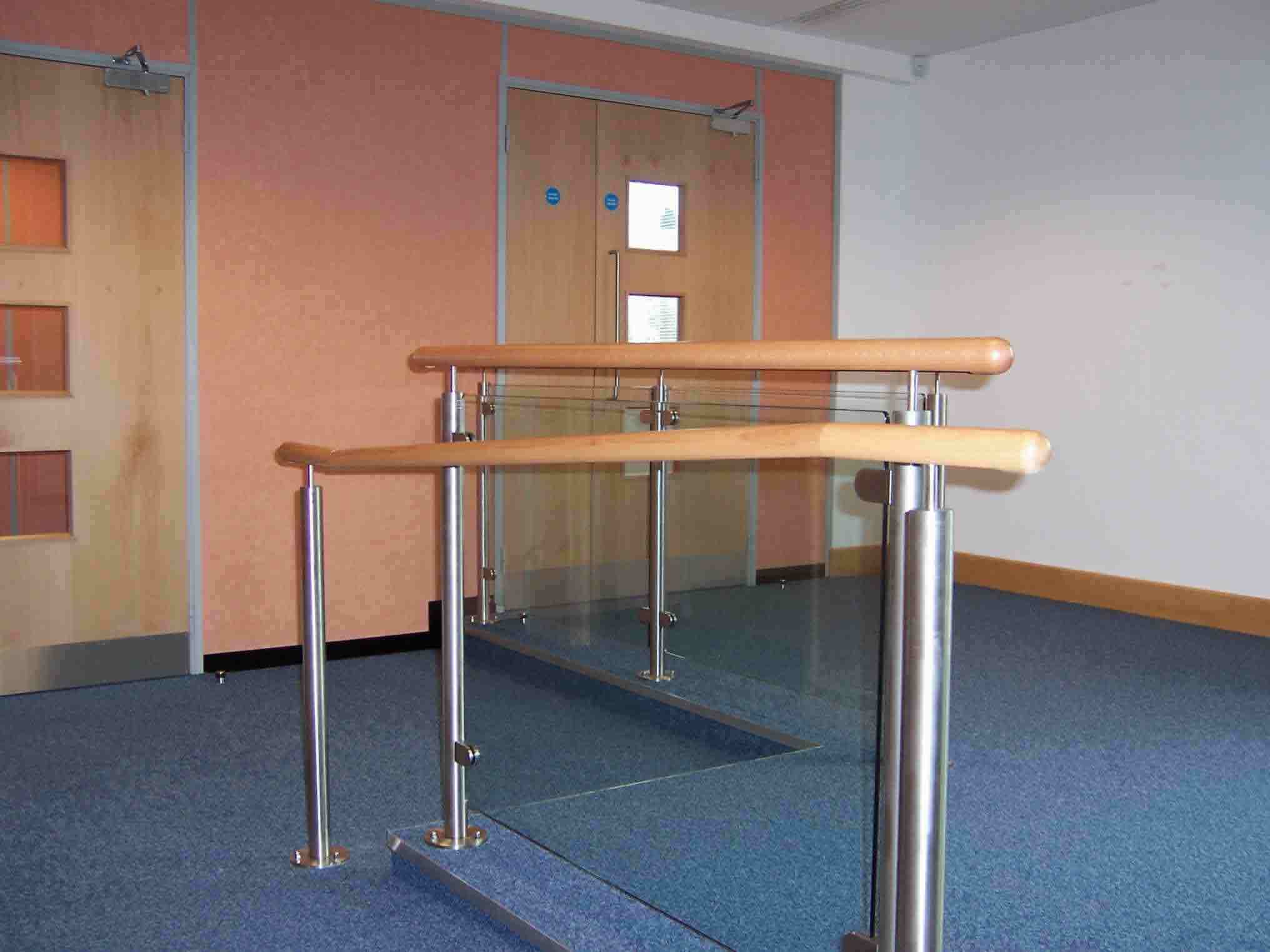 Balustrading & handrails provide accessibility in a modern office.